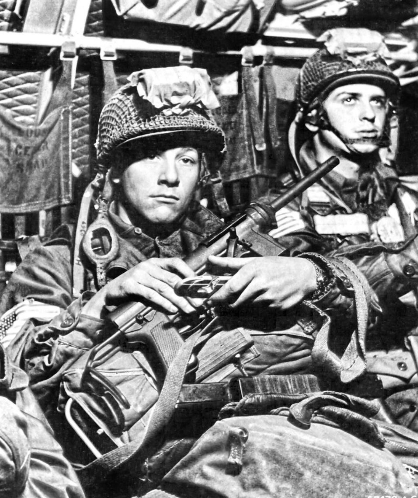 Two paratroopers of the 17th Airborne Division wait for takeoff on their C-46 during Operation Varsity